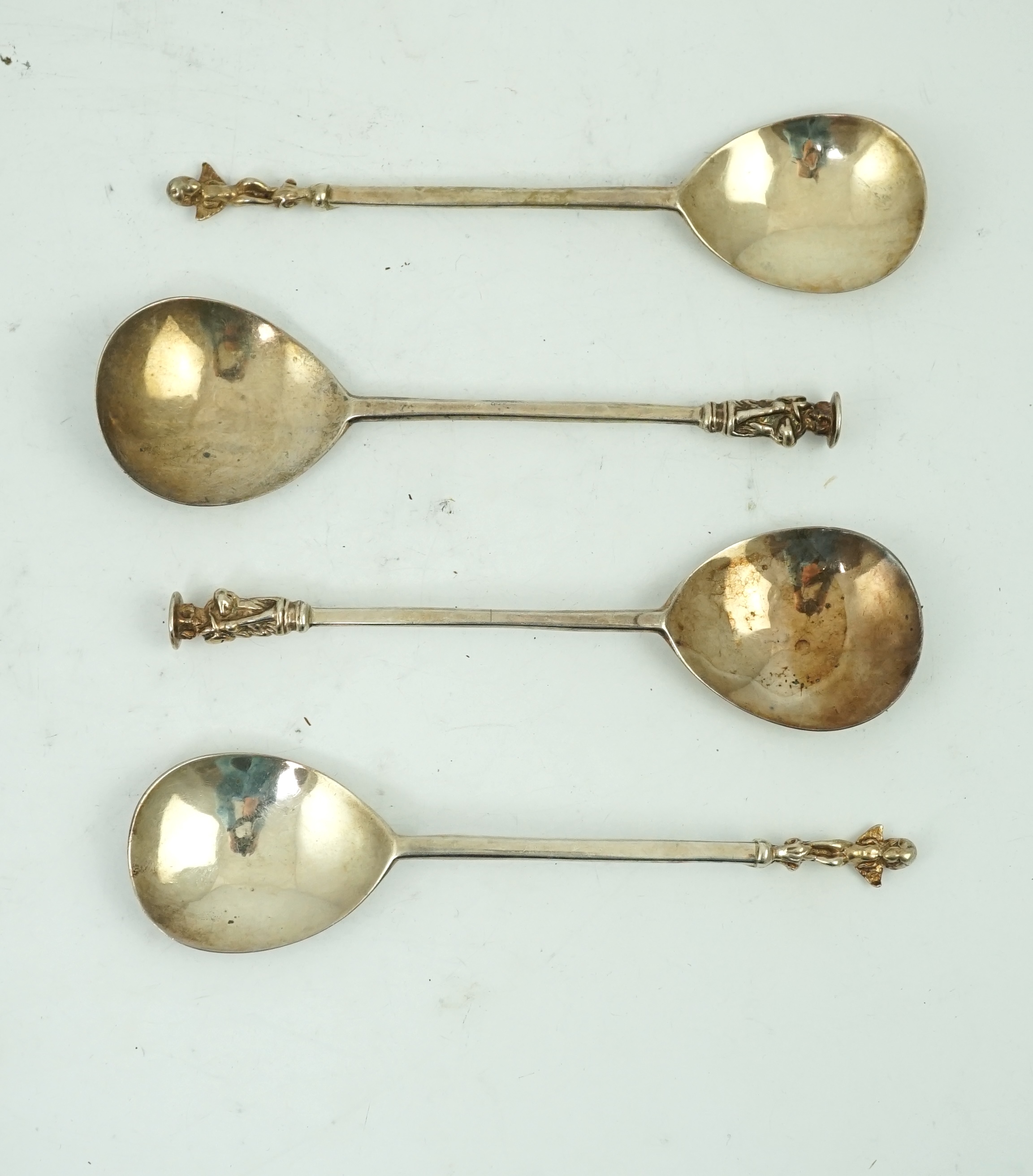 Four cased 18th century silver spoons